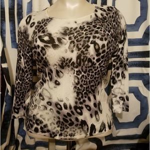Leopard print top.